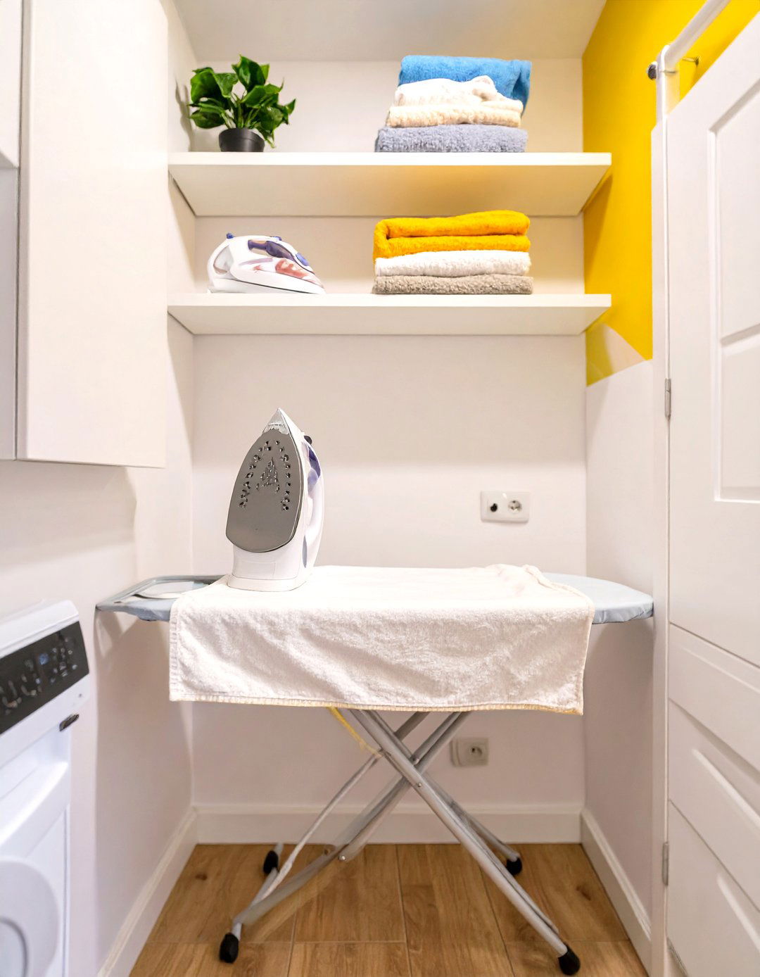 A Compact All in One Ironing Station - 30 tiny laundry room ideas