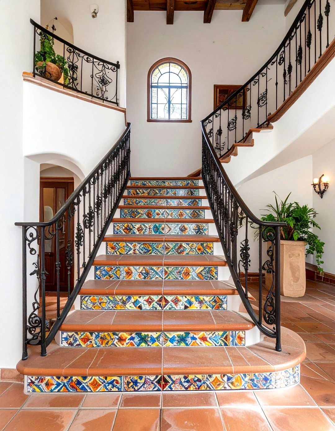 A Grand Hacienda Staircase with Wrought Iron - 30 mexican interior design ideas