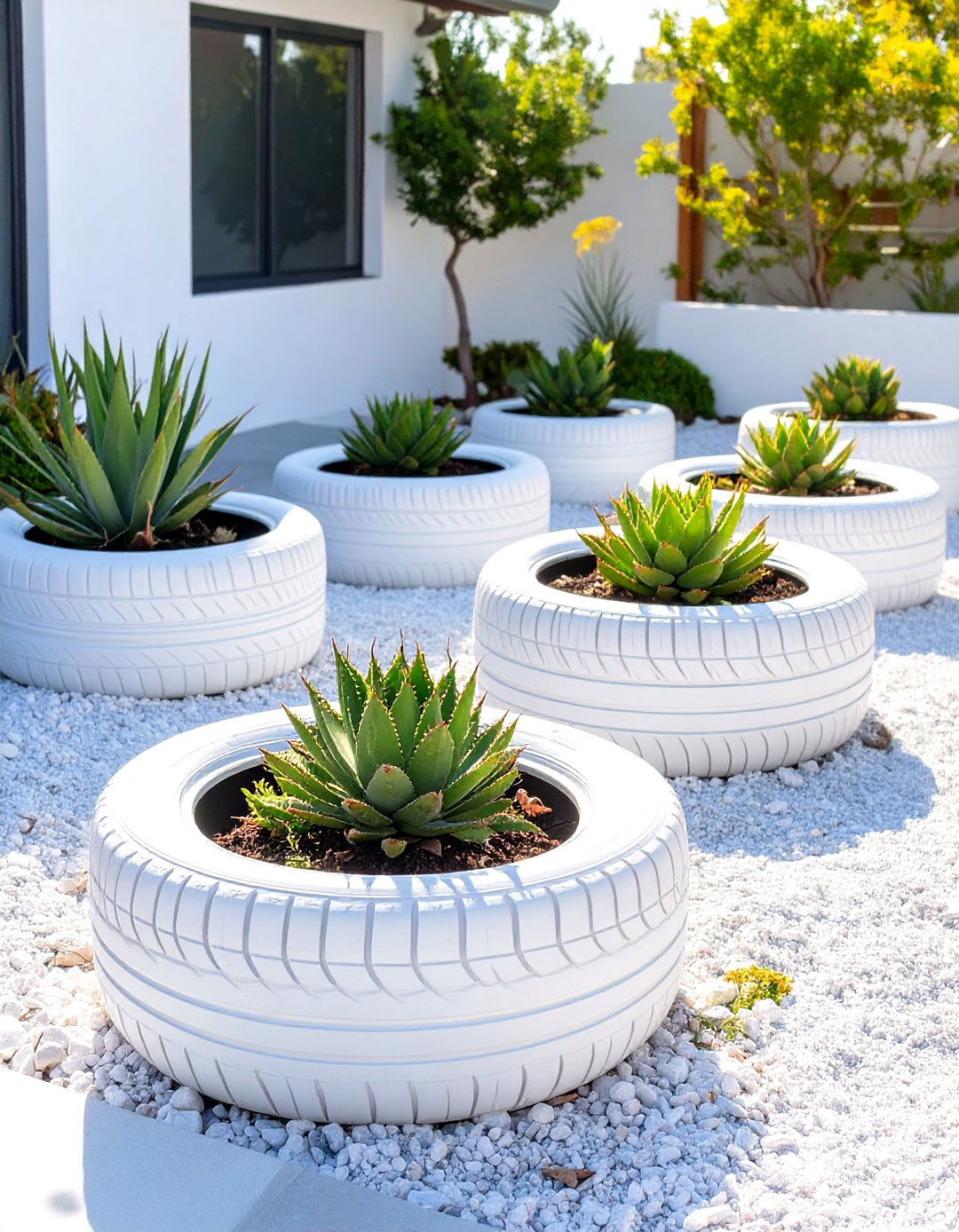 A Minimalist White Tyre Garden Layout - 30 creative landscape tyre garden designs