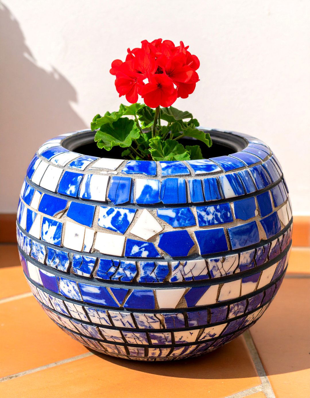 A Mosaic Tile Tyre Garden Planter - 30 creative landscape tyre garden designs