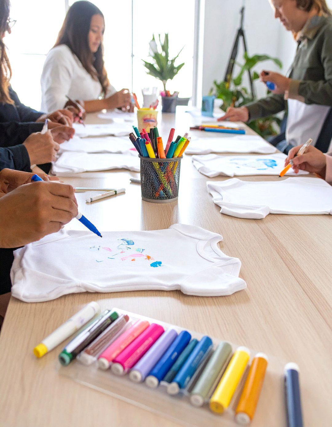 A Onesie Decorating Station - 30 work baby shower ideas