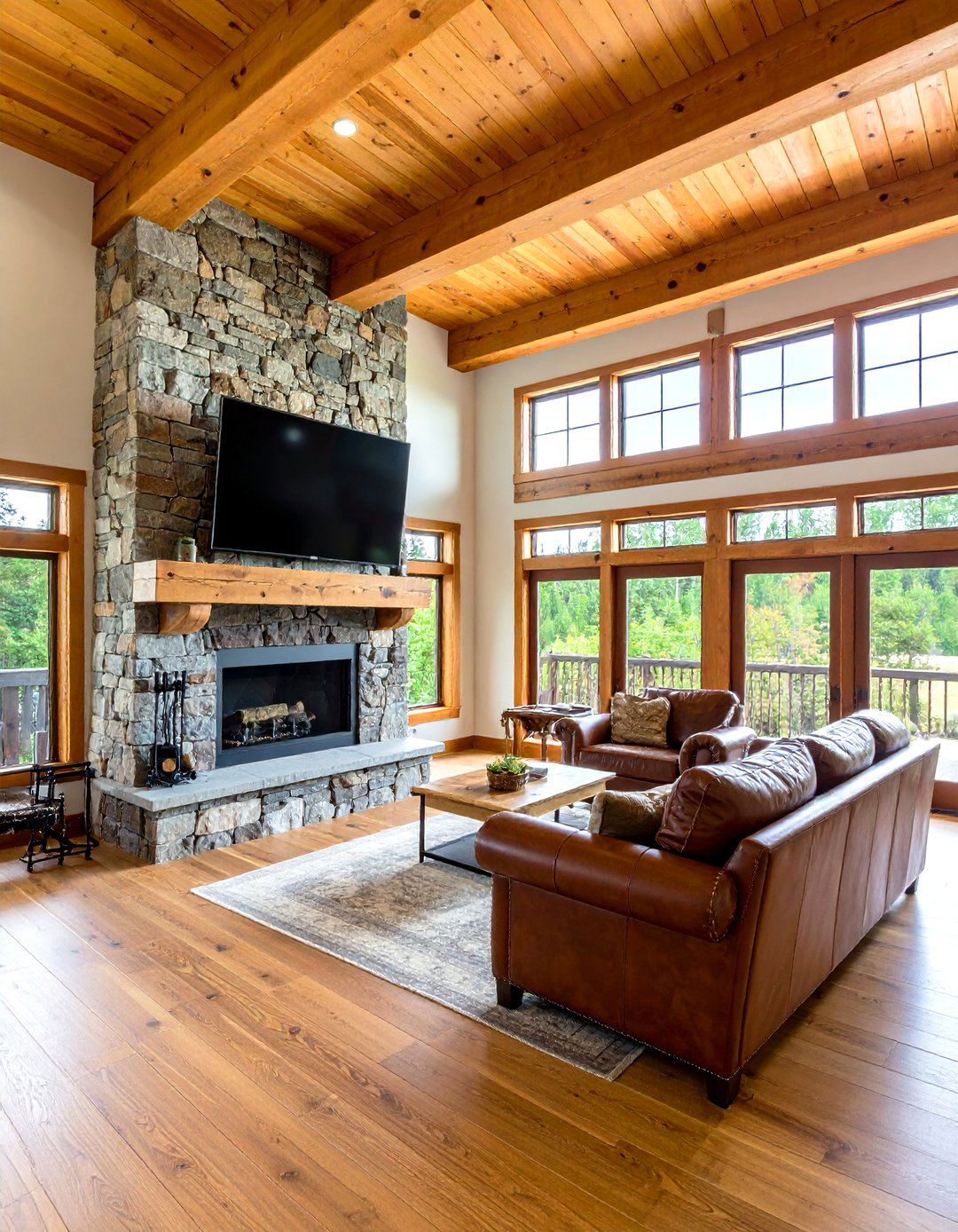 A Rustic Living Room with a Stone Fireplace and TV - 30 living room ideas with tv