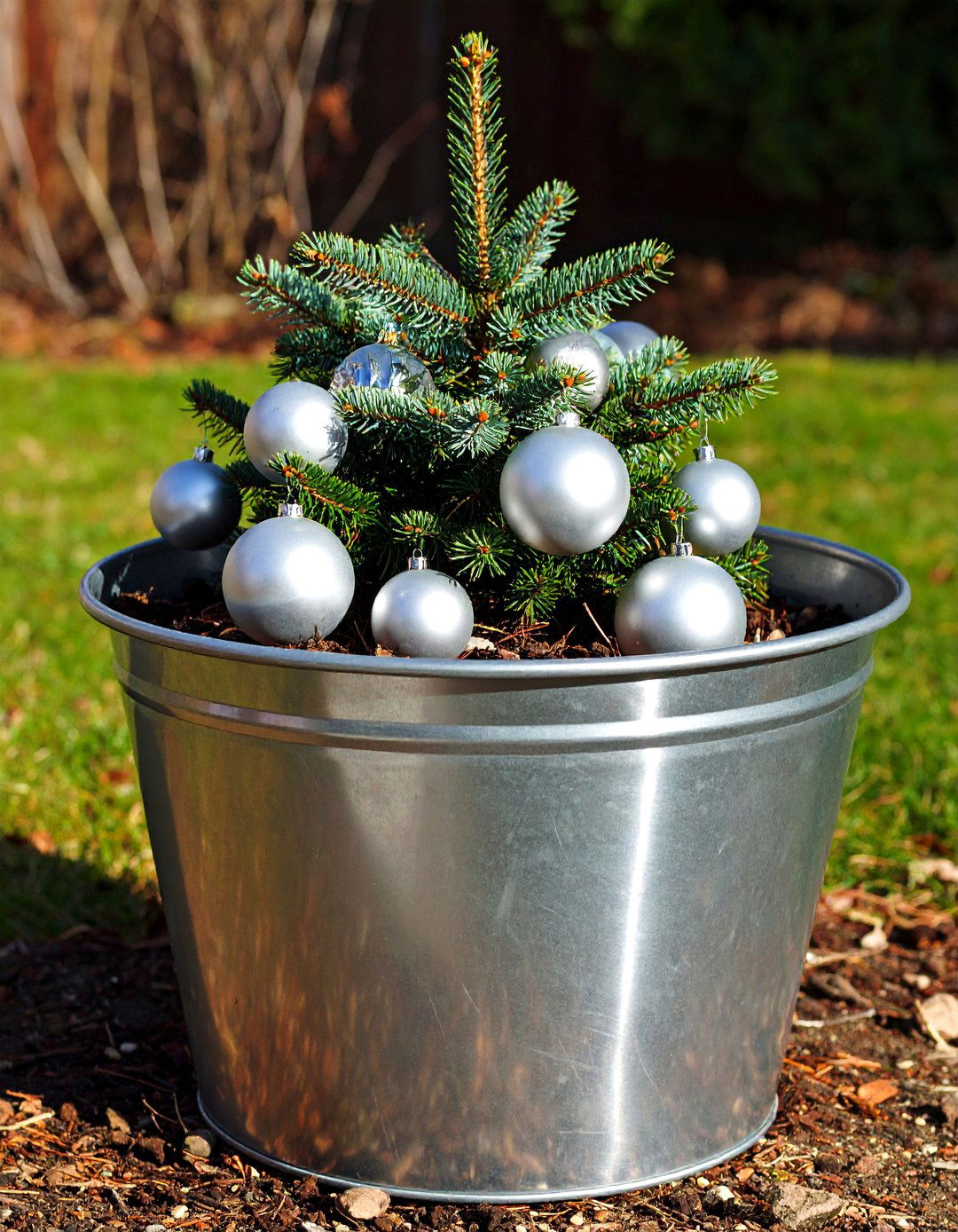 Blue Spruce and Silver Bauble Winter Planter - 30 outdoor winter planter ideas