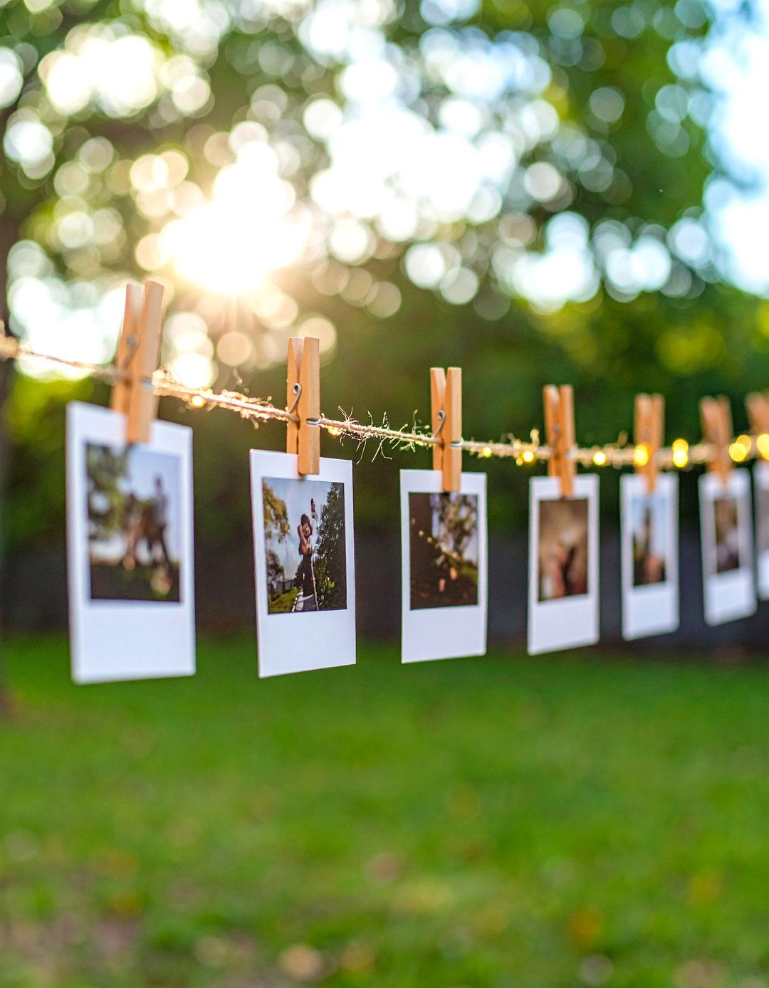 Clothespin Fairy Light Photo Display - 30 diy backyard lighting ideas