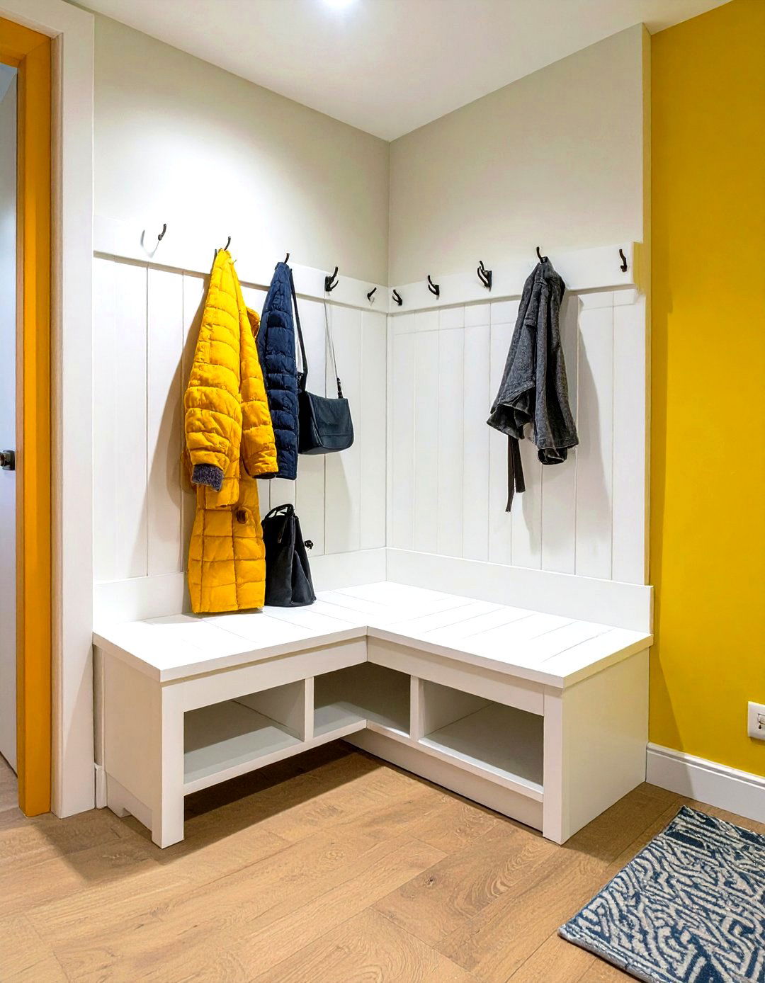 Compact Corner Bench with Hooks - 30 hallway storage ideas