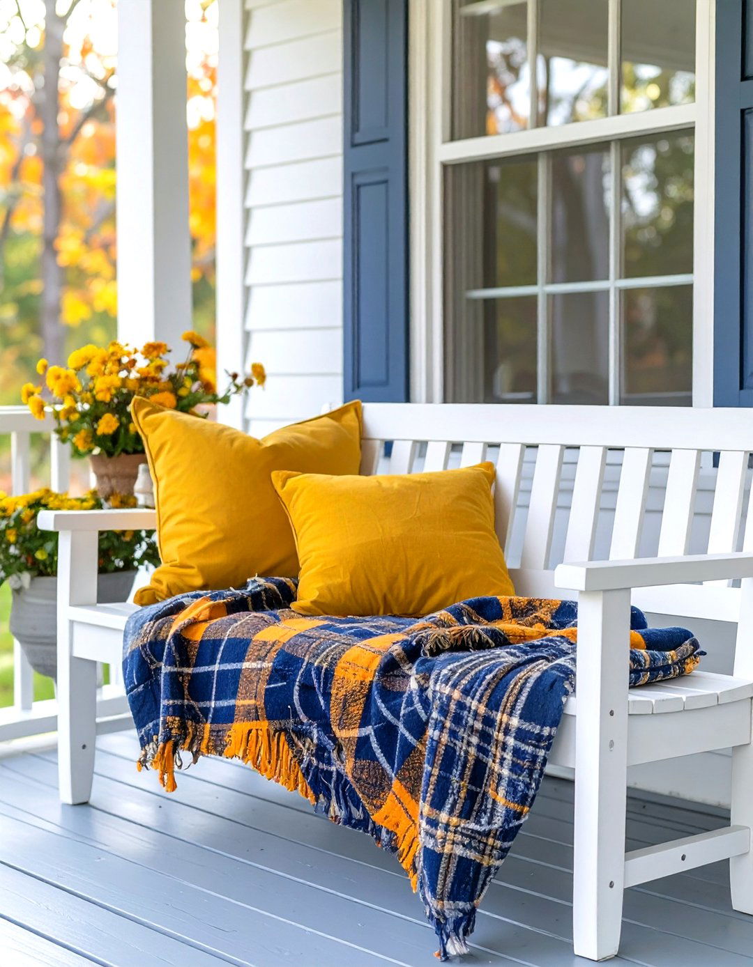 Cozy Porch Seating with Plaid Throws - 30 outdoor fall decor ideas