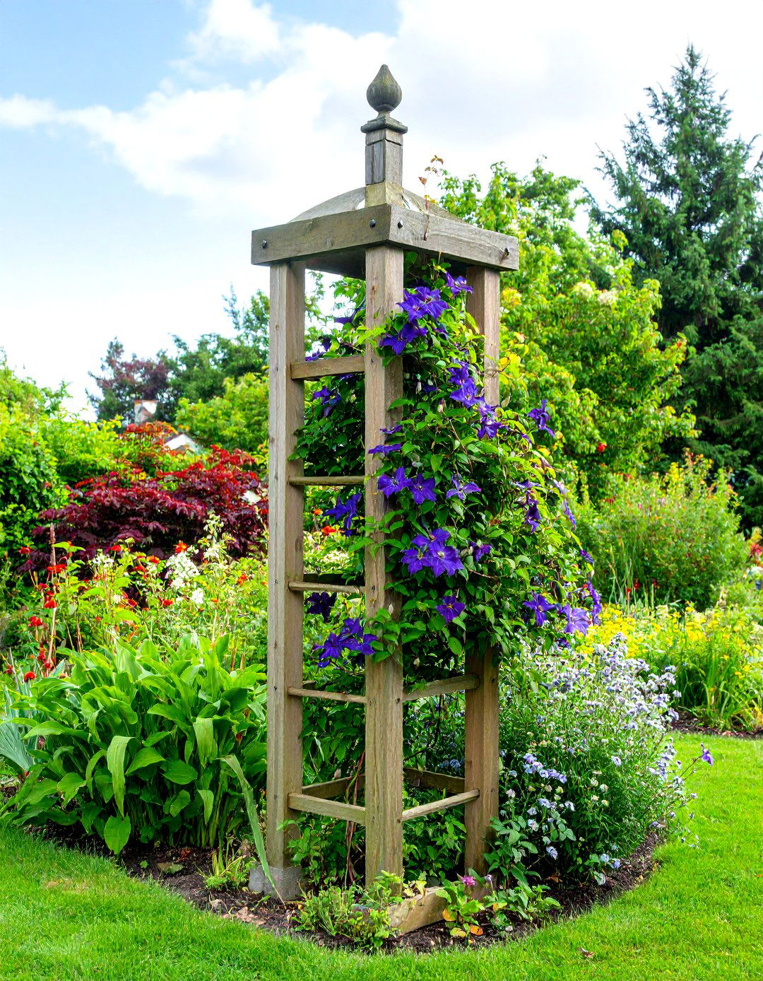 DIY Garden Obelisk from Lumber - 30 diy garden trellis ideas