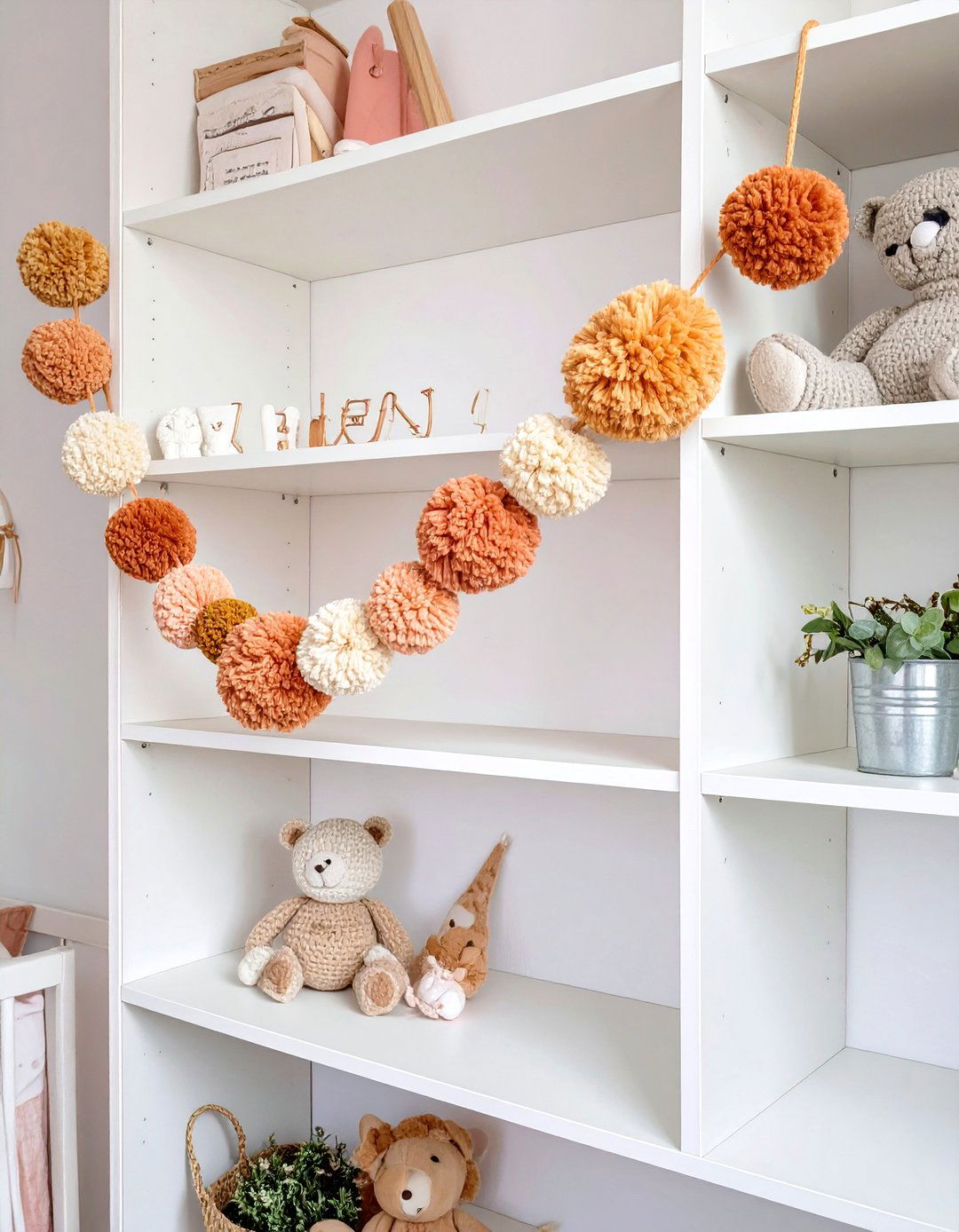 DIY Pom Pom Garland - 30 toddler girl room ideas on a budget