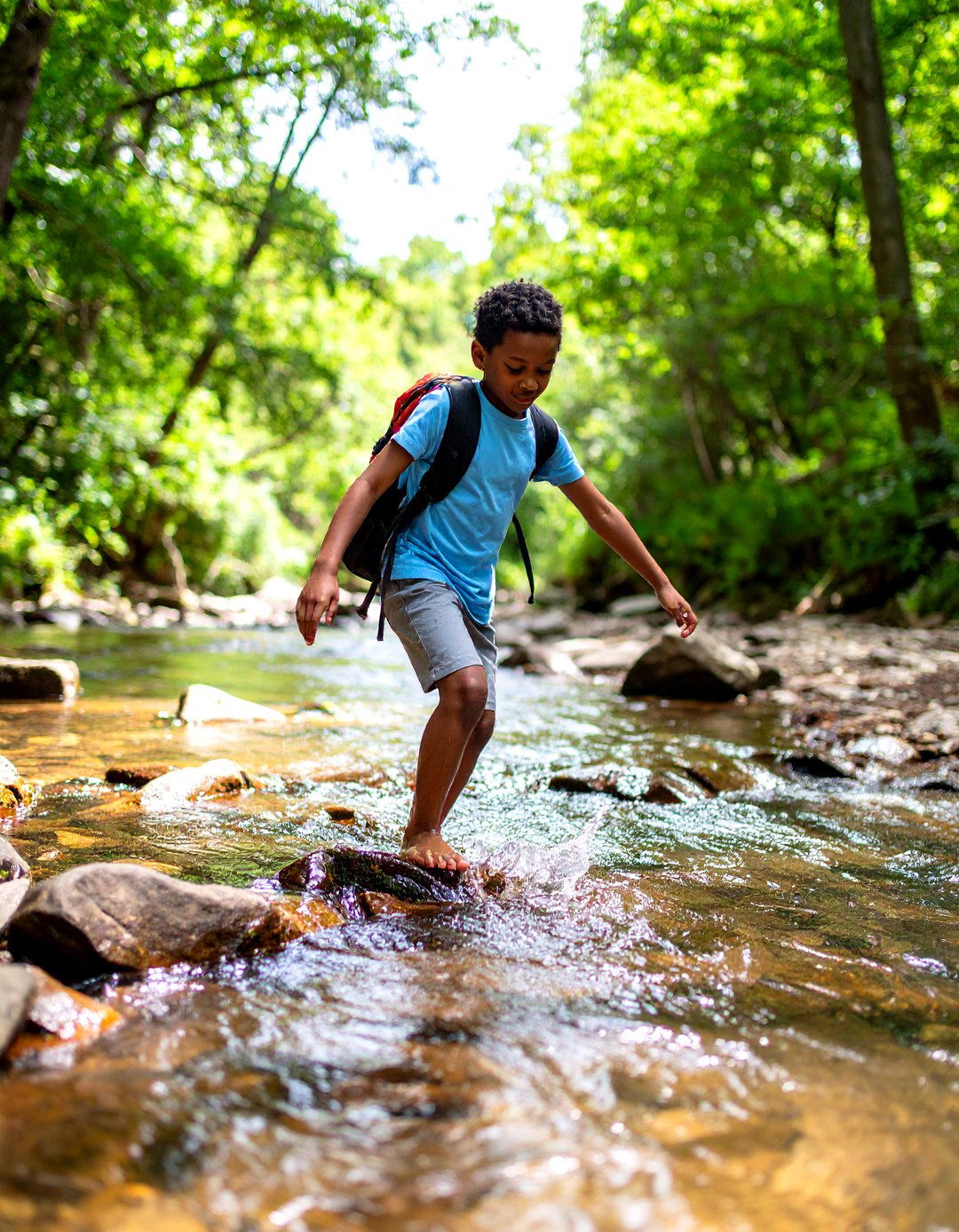 Firefly Create a high quality image with extra brightness of a senior boy skipping stones - 30 outdoor senior picture ideas