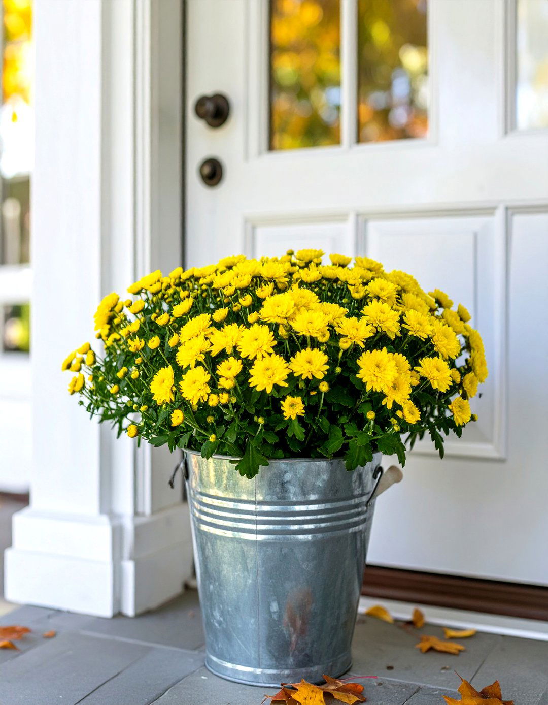 Galvanized Bucket with Mums - 30 small front porch fall decorating ideas