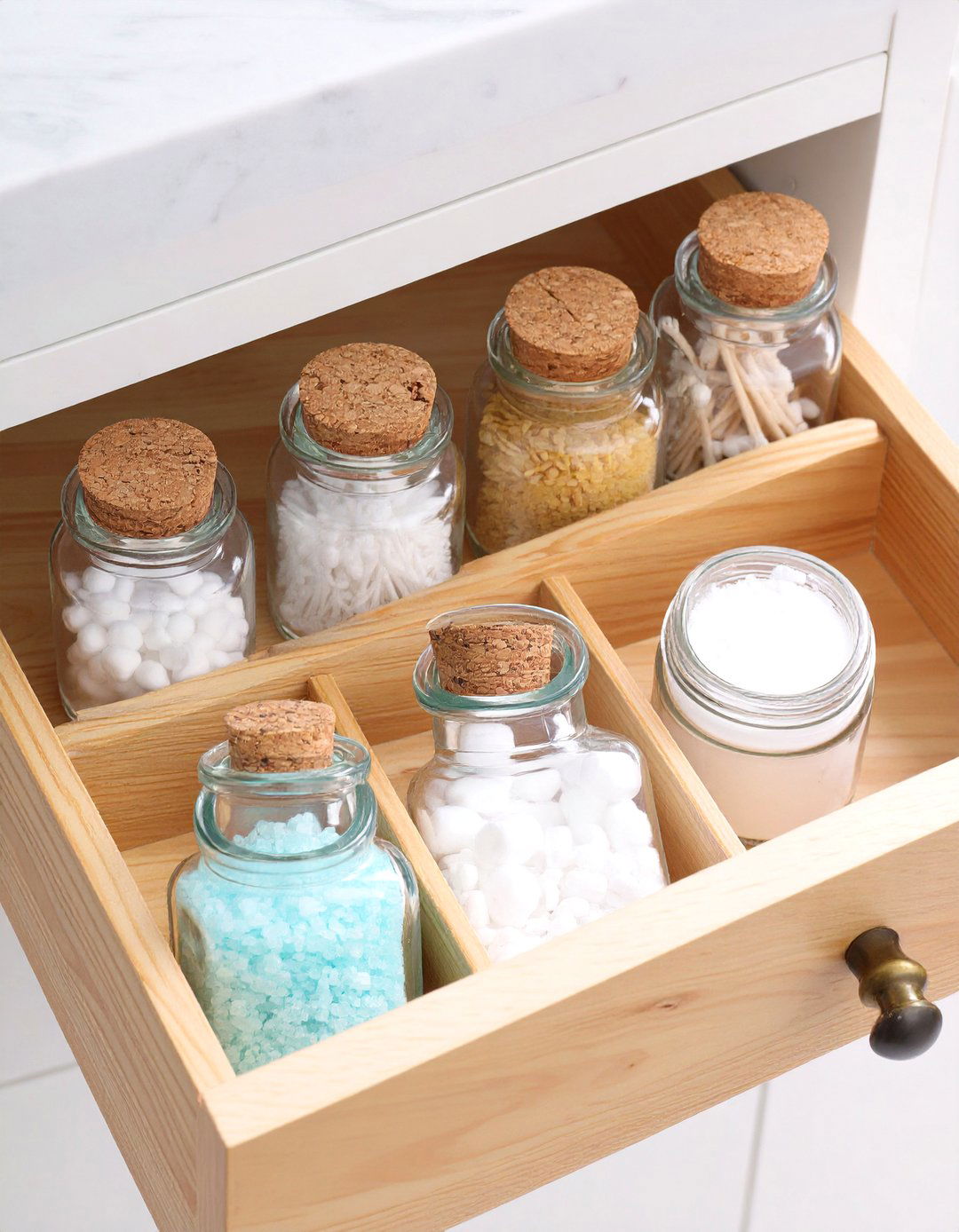 Glass Jars and Canisters for a Vintage Look - 30 bathroom drawer organization ideas