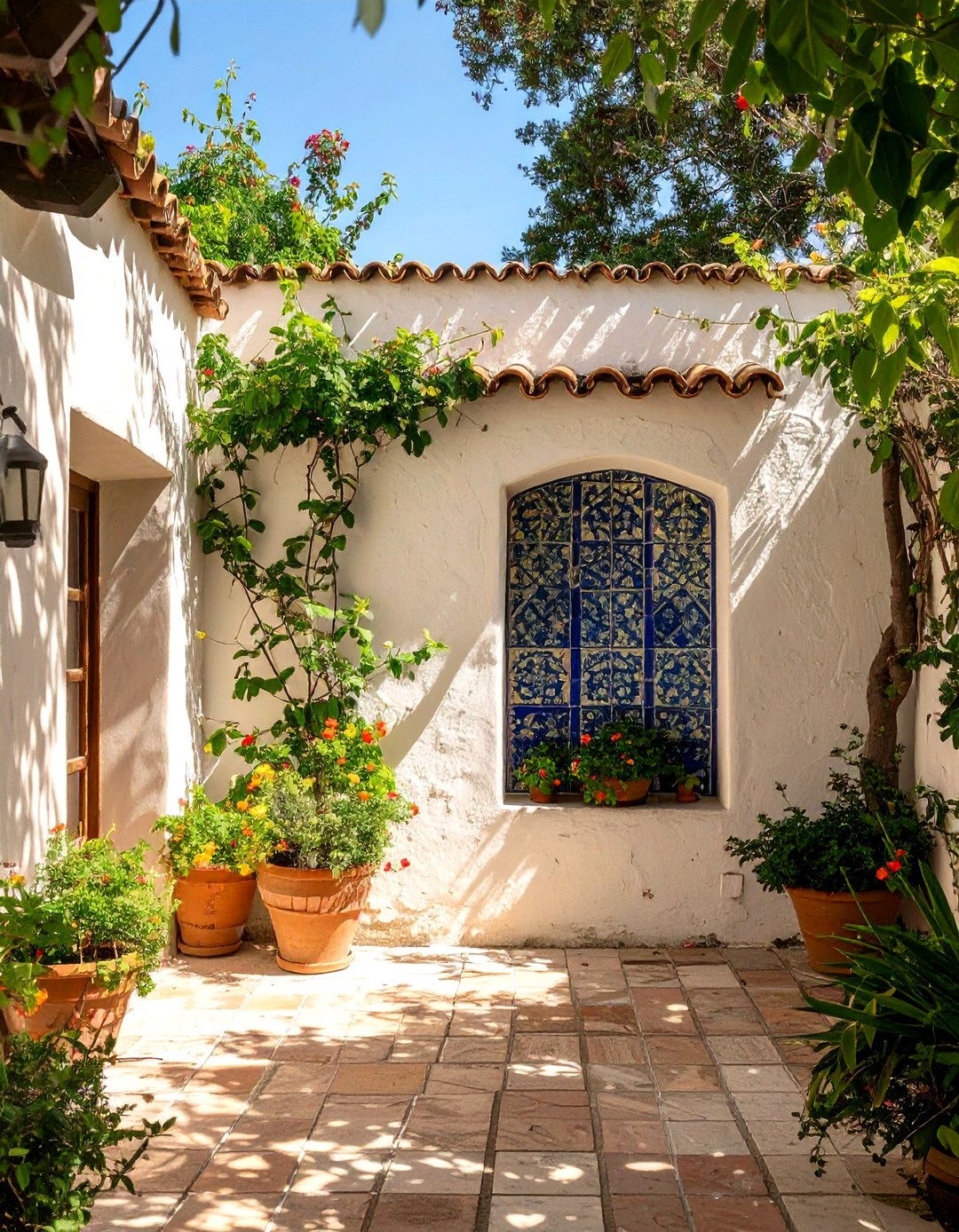 Mediterranean Stucco and Tile Wall - 30 backyard wall ideas
