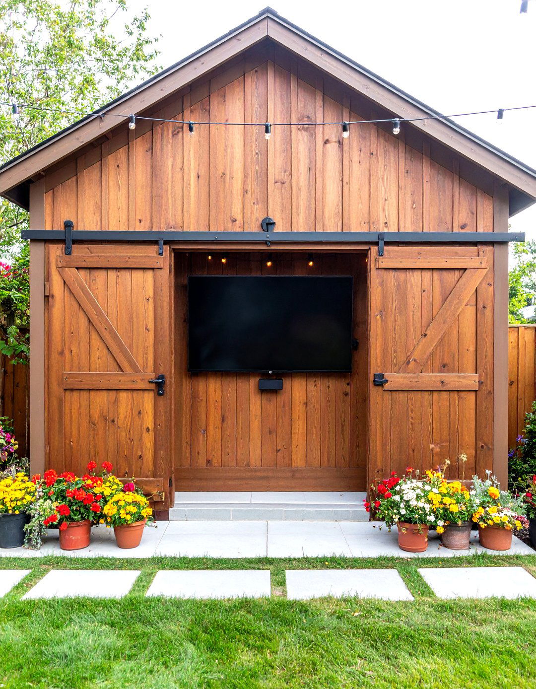 Outdoor TV Mount with a Sliding Barn Door Cover - 30 outdoor tv mount ideas