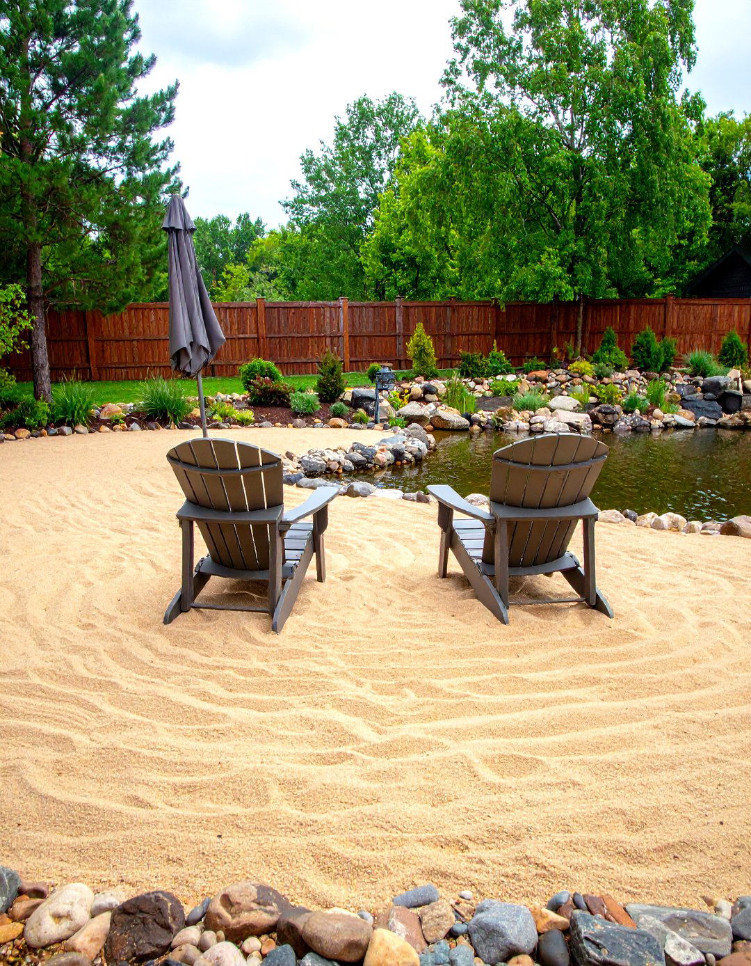 Pond with a Beach Style Entry - 30 pond landscaping ideas