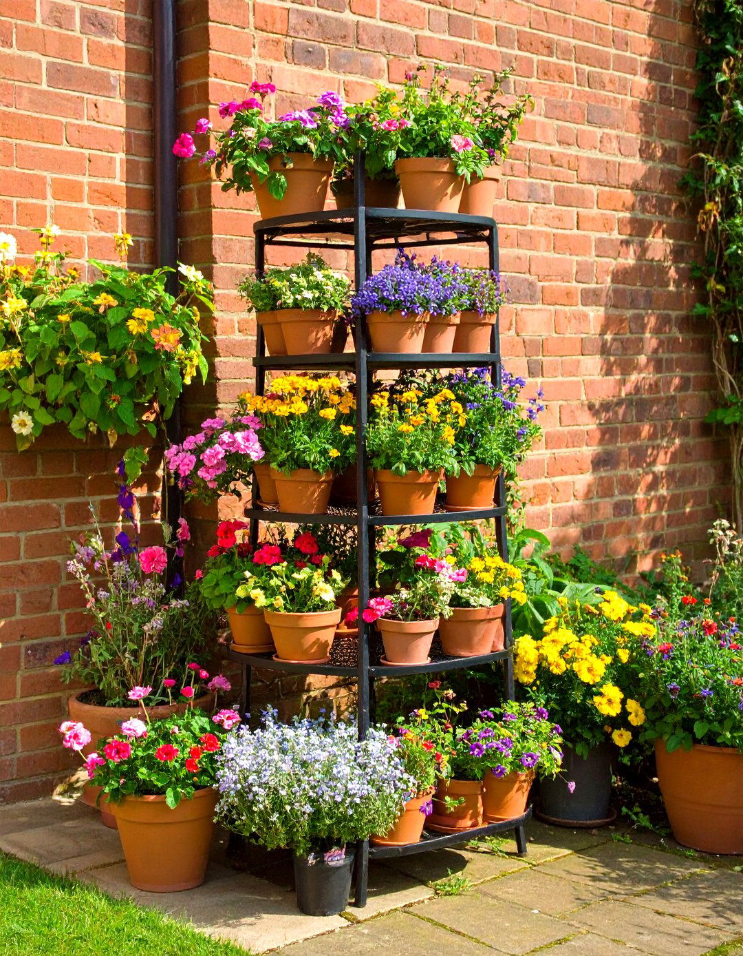 Rectangular Patio with Tiered Plant Stands - 30 patio layout ideas rectangle