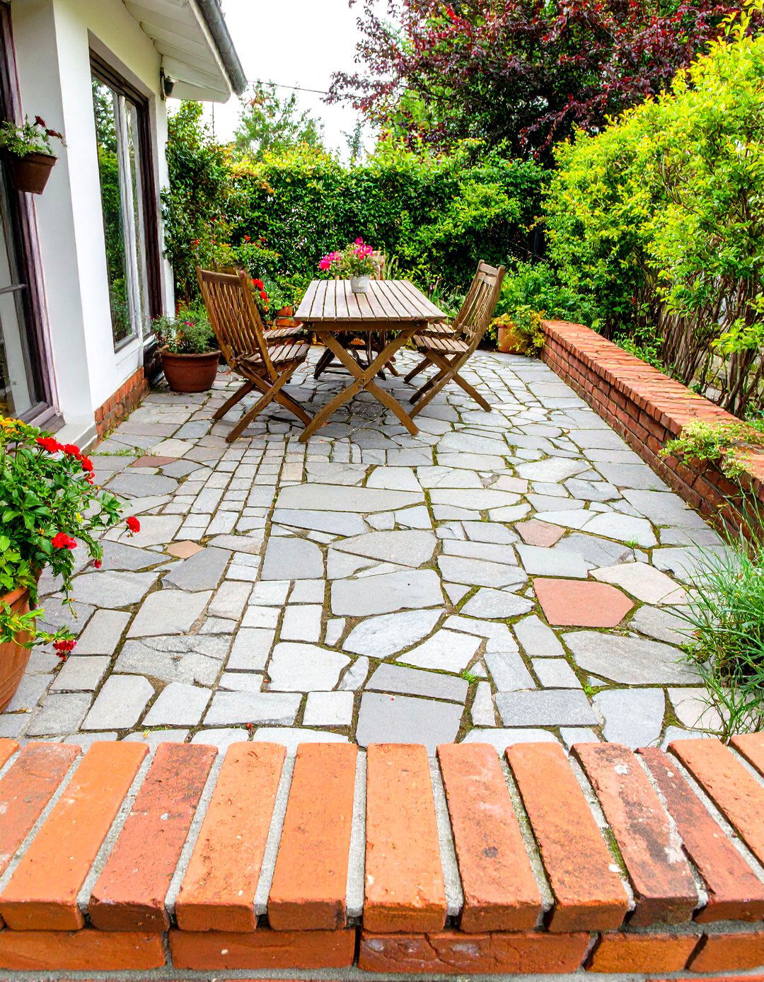 Salvaged Brick and Stone Combination - 30 stone patio ideas on a budget