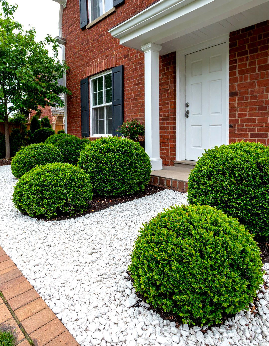 The Formal Boxwood Parterre - 30 landscape ideas for front of house low maintenance