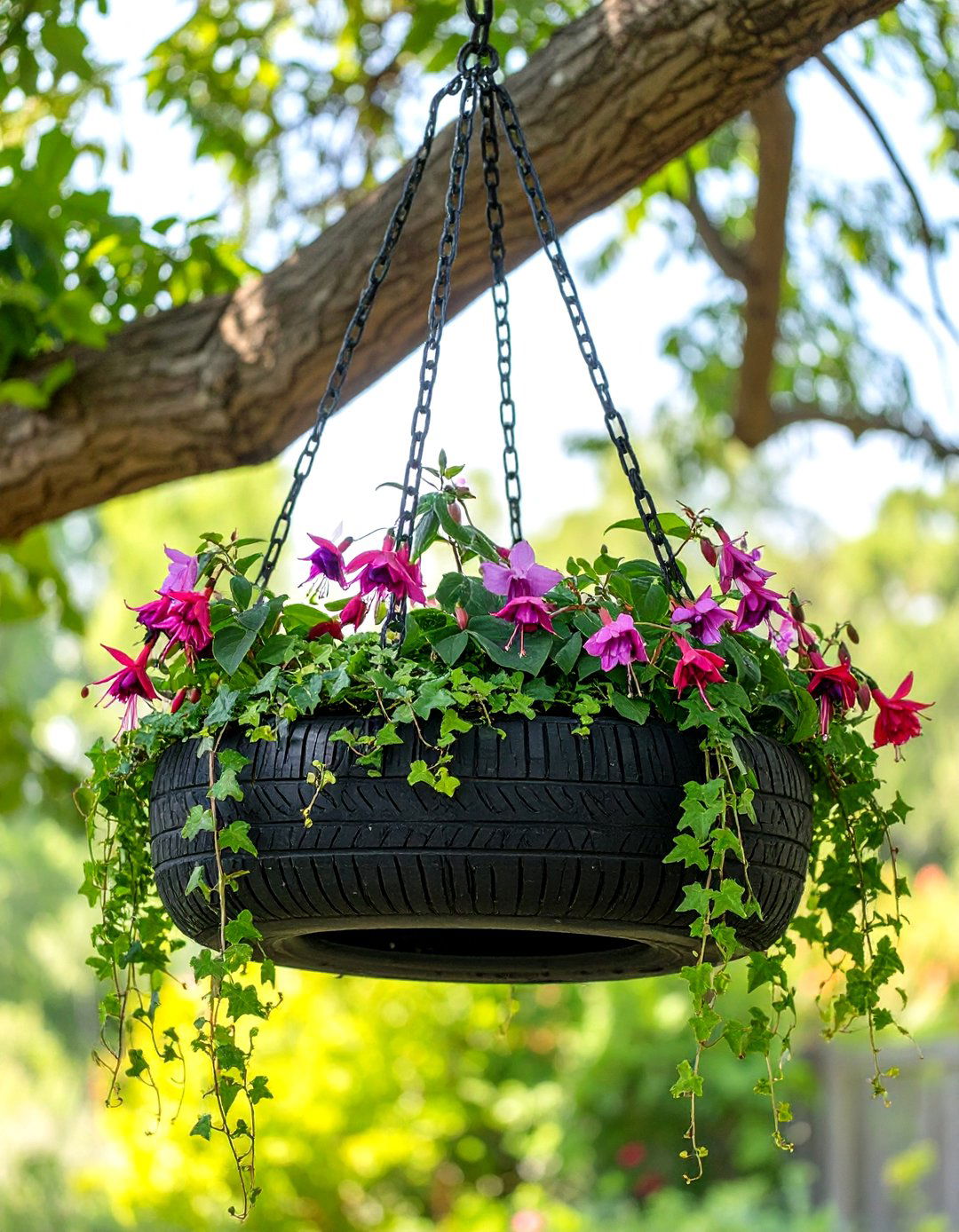 The Inverted Tyre Garden Hanging Baskets - 30 creative landscape tyre garden designs