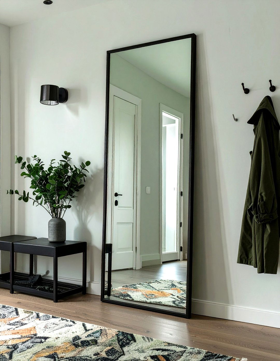 The Minimalist Floor Leaner Entryway Mirror - 30 modern entryway mirror ideas