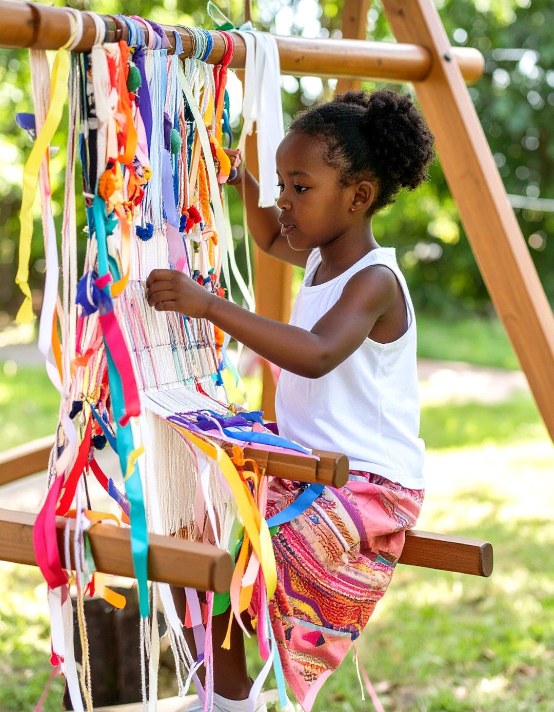 The Outdoor Weaving Loom Playground - 30 kid friendly small backyard playground ideas