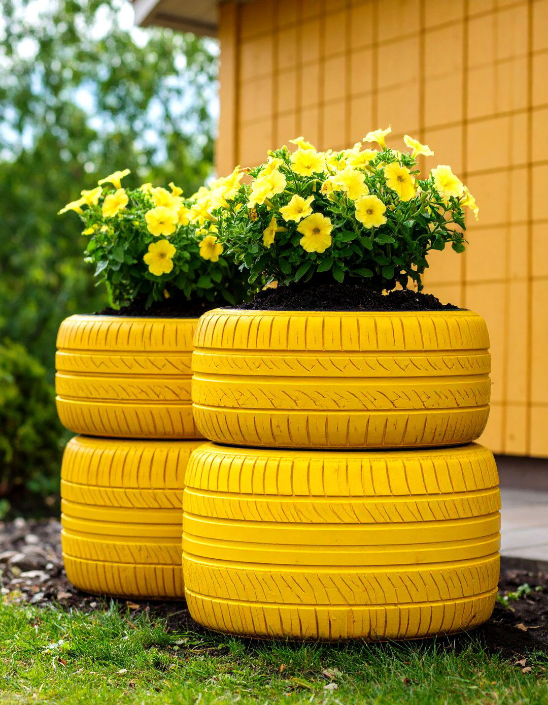 The Repurposed Tire Planter - 30 garden box ideas