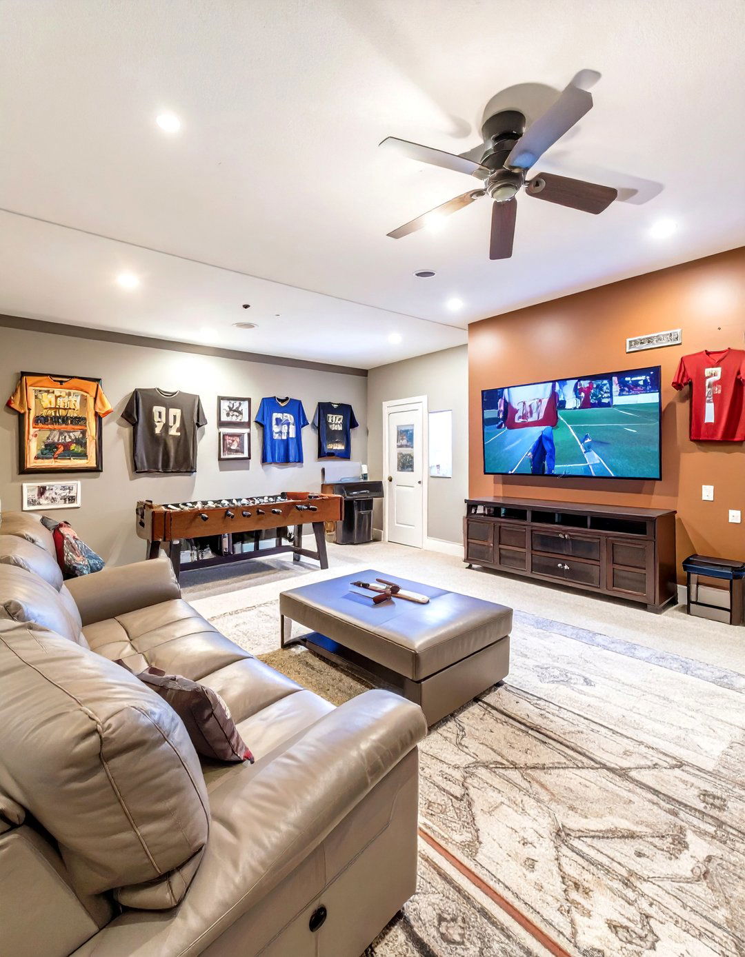The Sports Fans Ultimate Cave - 30 basement room ideas
