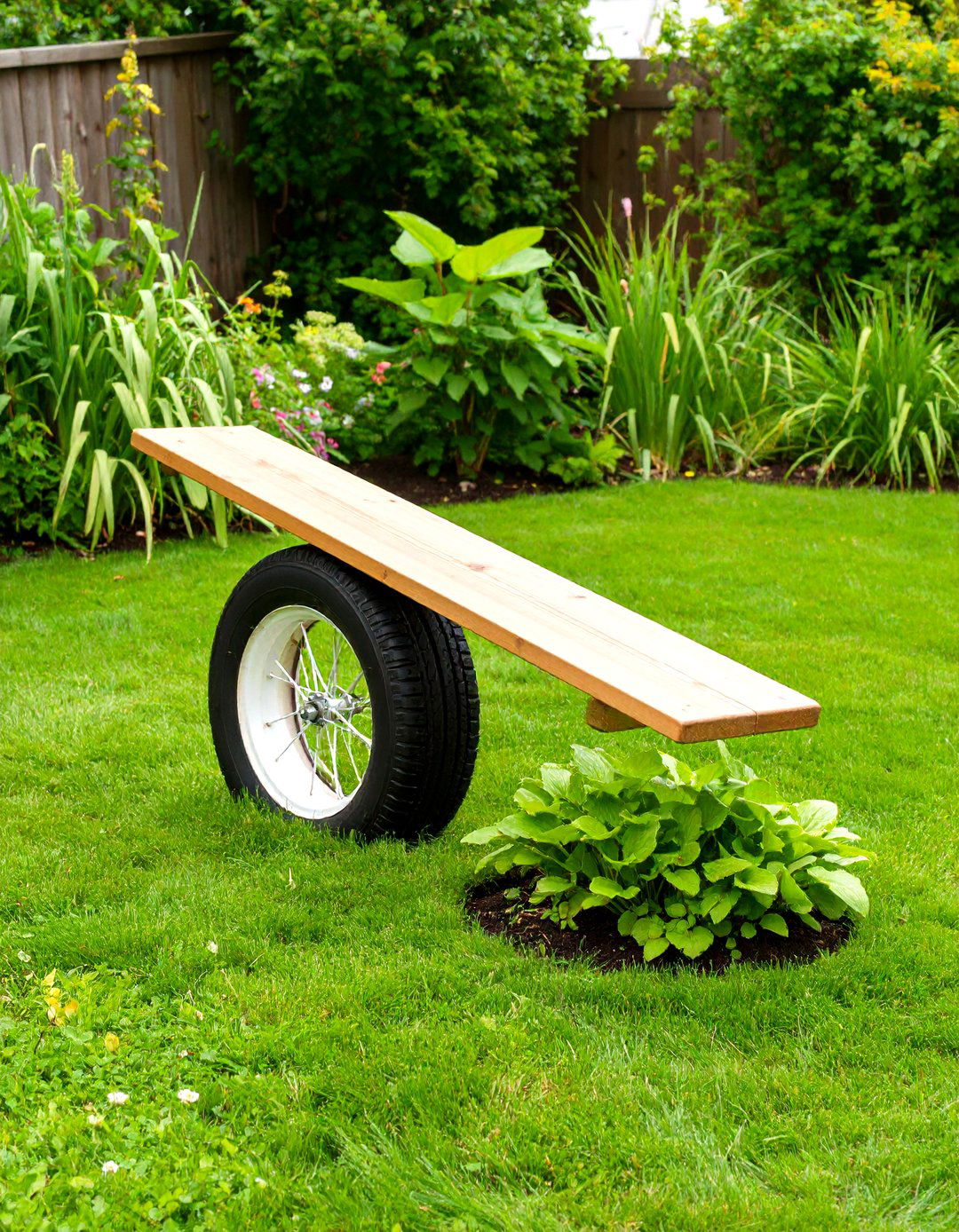 The Tyre Garden See Saw Planter - 30 creative landscape tyre garden designs