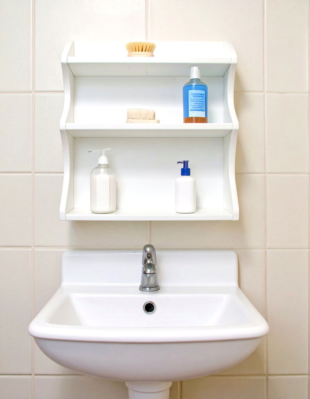 Tiered Shelving Over a Utility Sink - 30 laundry shelf ideas
