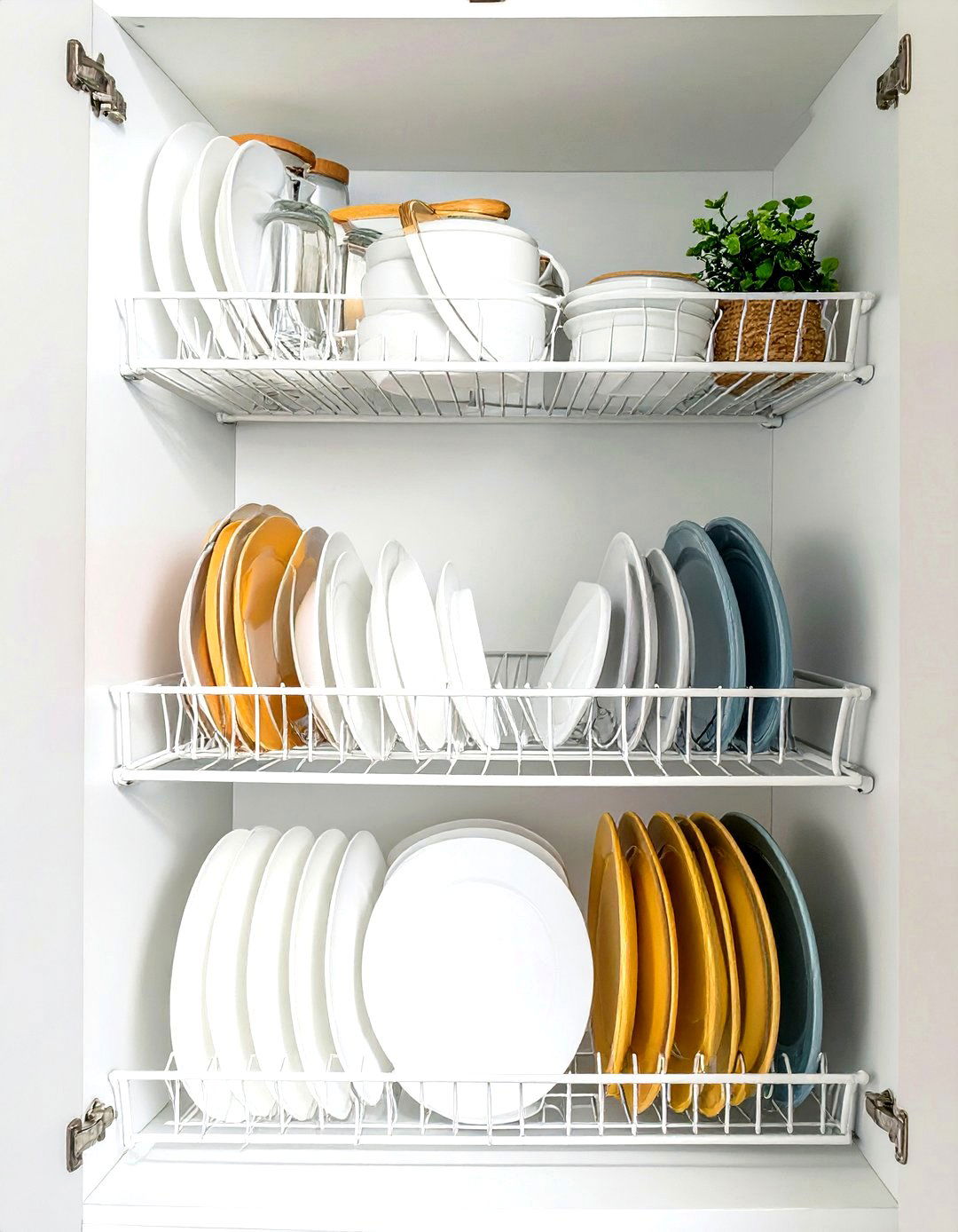 Use Vertical Plate Racks Inside Cabinets - 30 small galley kitchen ideas on a budget