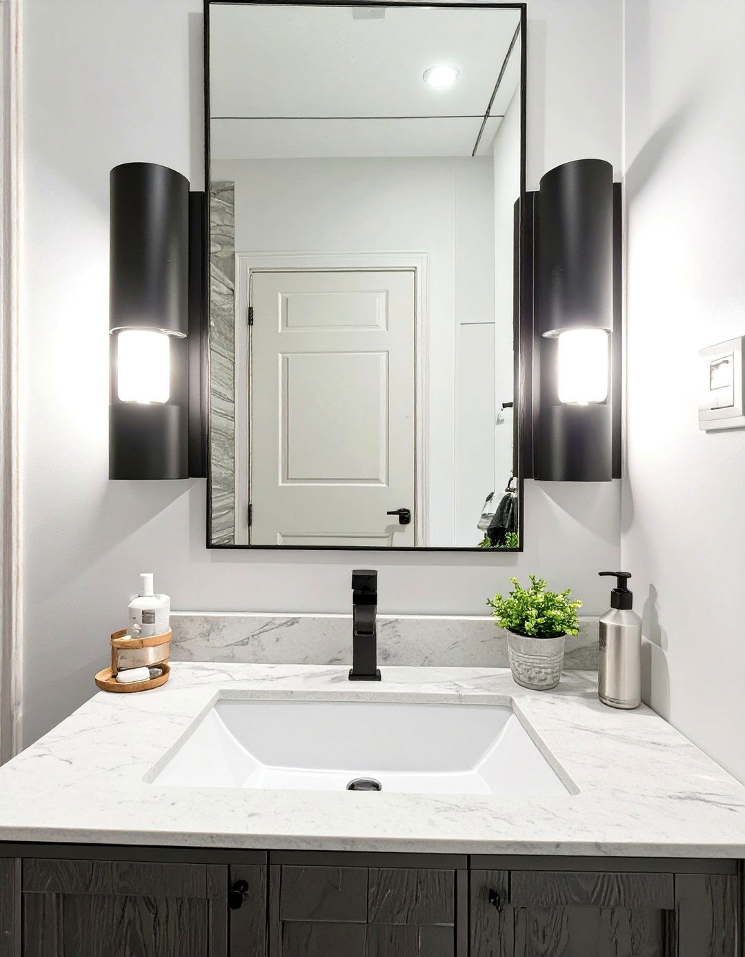 Wall Sconces Flanking the Mirror - 30 small half bathroom ideas