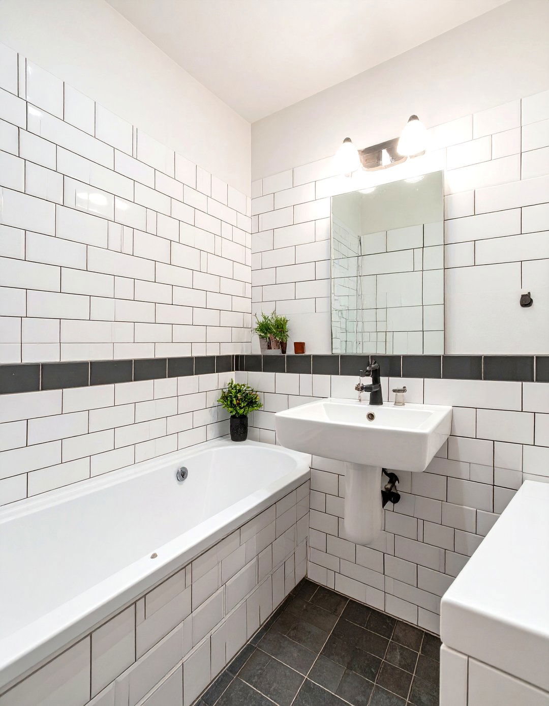 White Subway Tile with Dark Grout - 30 small bathroom tile ideas