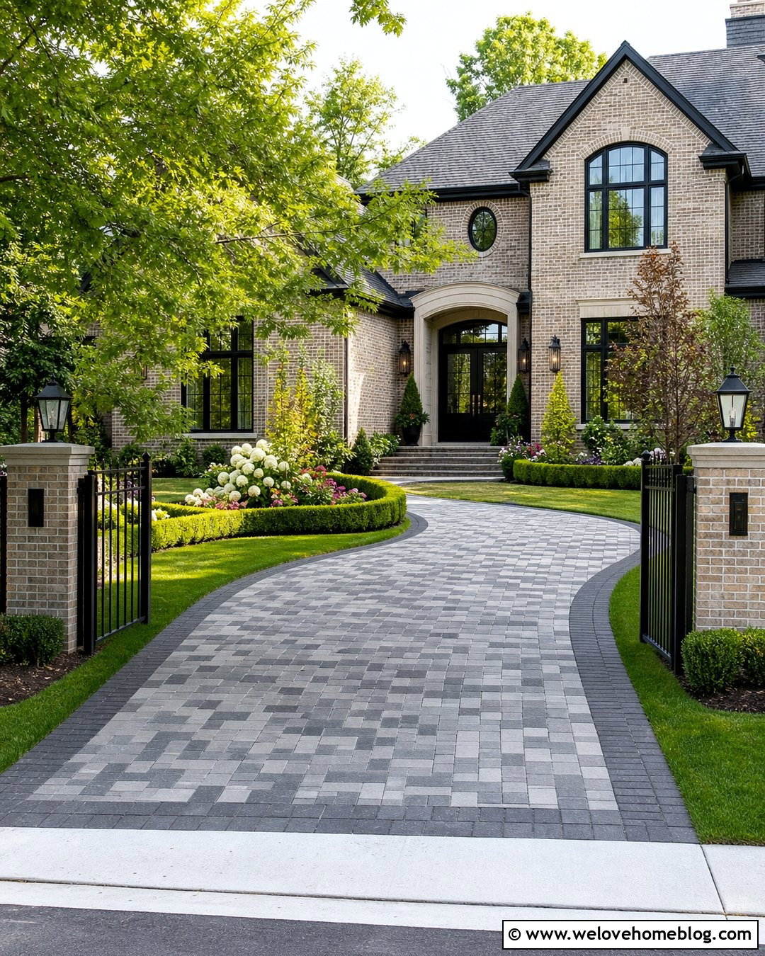 Black Metal Fence Lined Paver Driveway - 20 Fence Lined Driveway Ideas