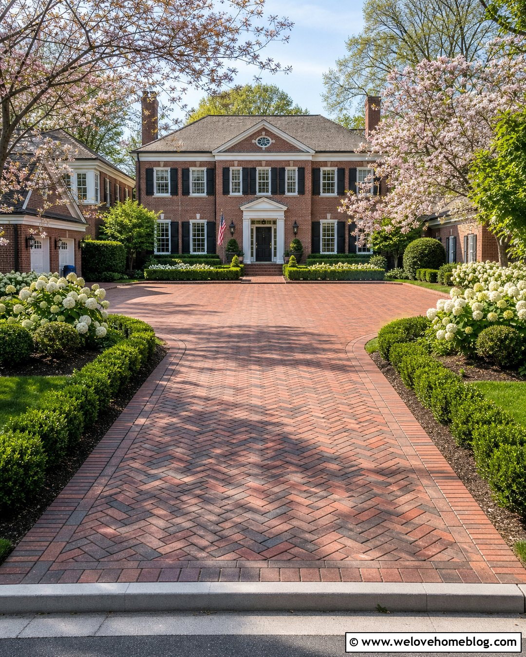 Brick Driveway With a Herringbone Motor Court - 20 large driveway design ideas