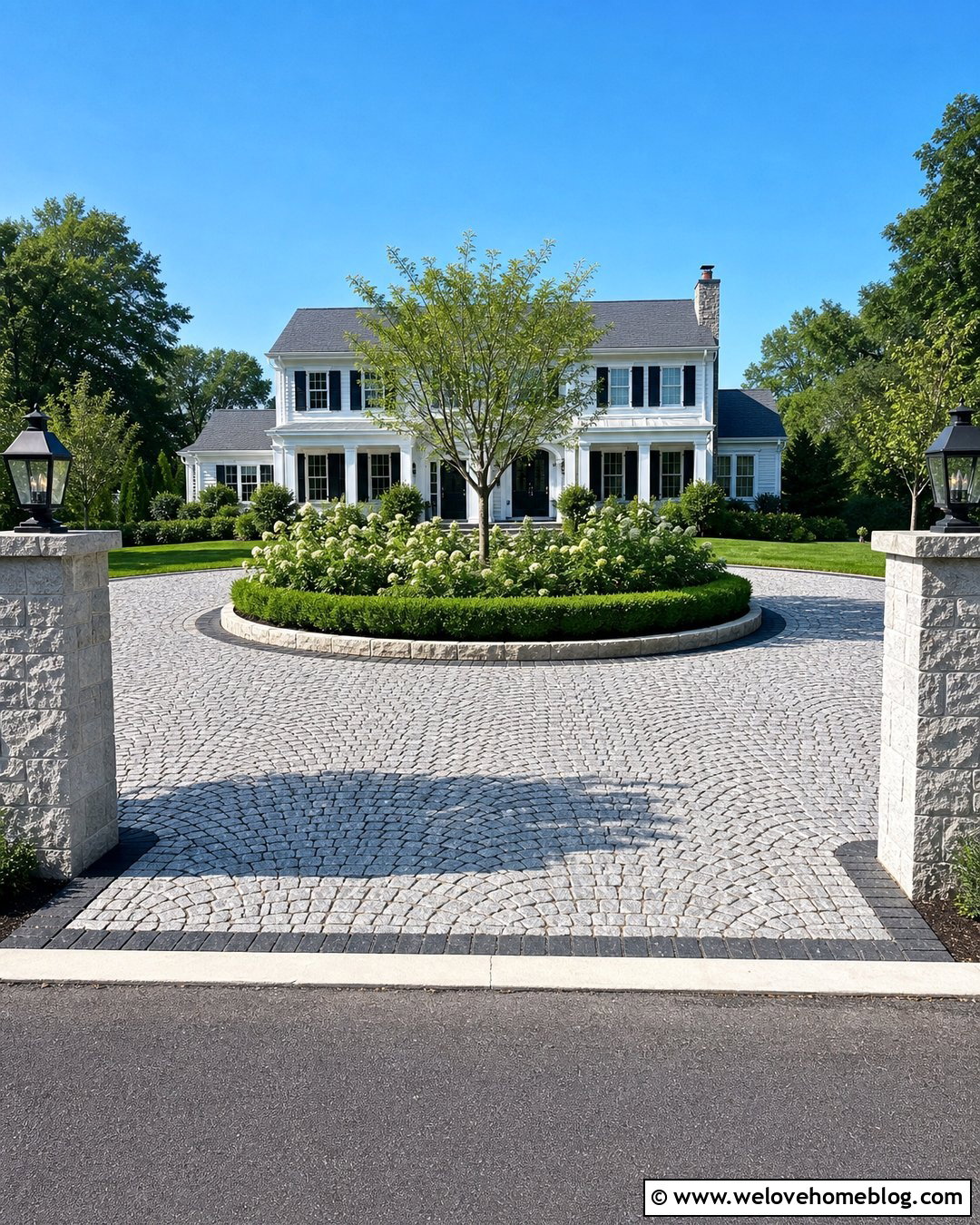 Circular Cobblestone Driveway With a Central Garden - 20 luxury cobblestone driveway ideas