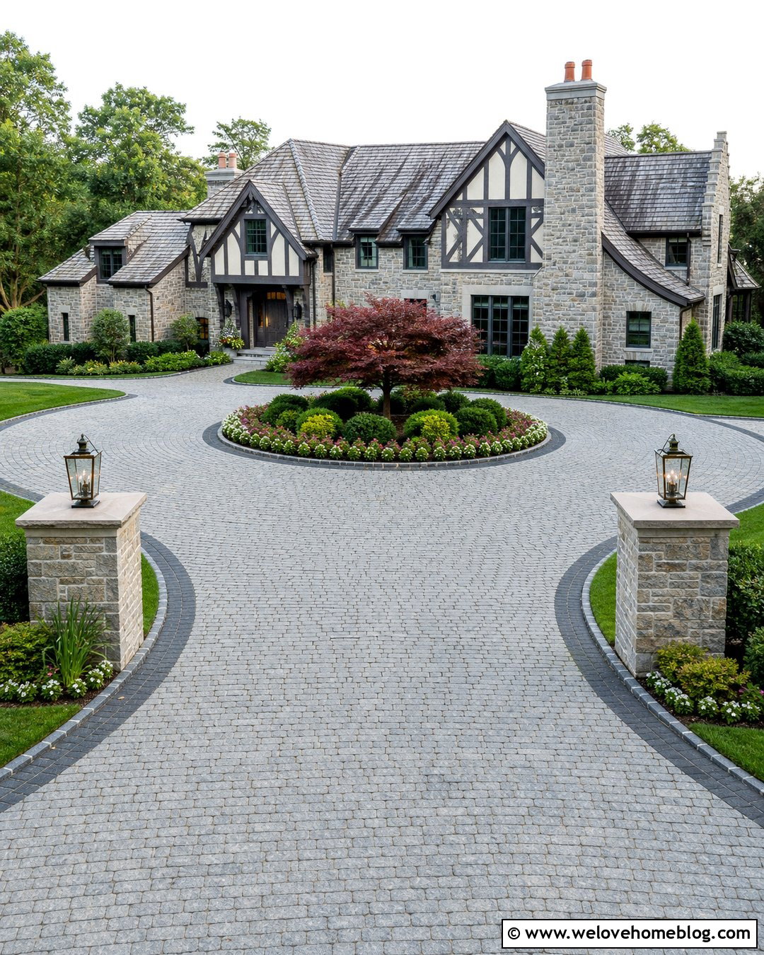 Circular Cobblestone Paver Driveway With Center Garden