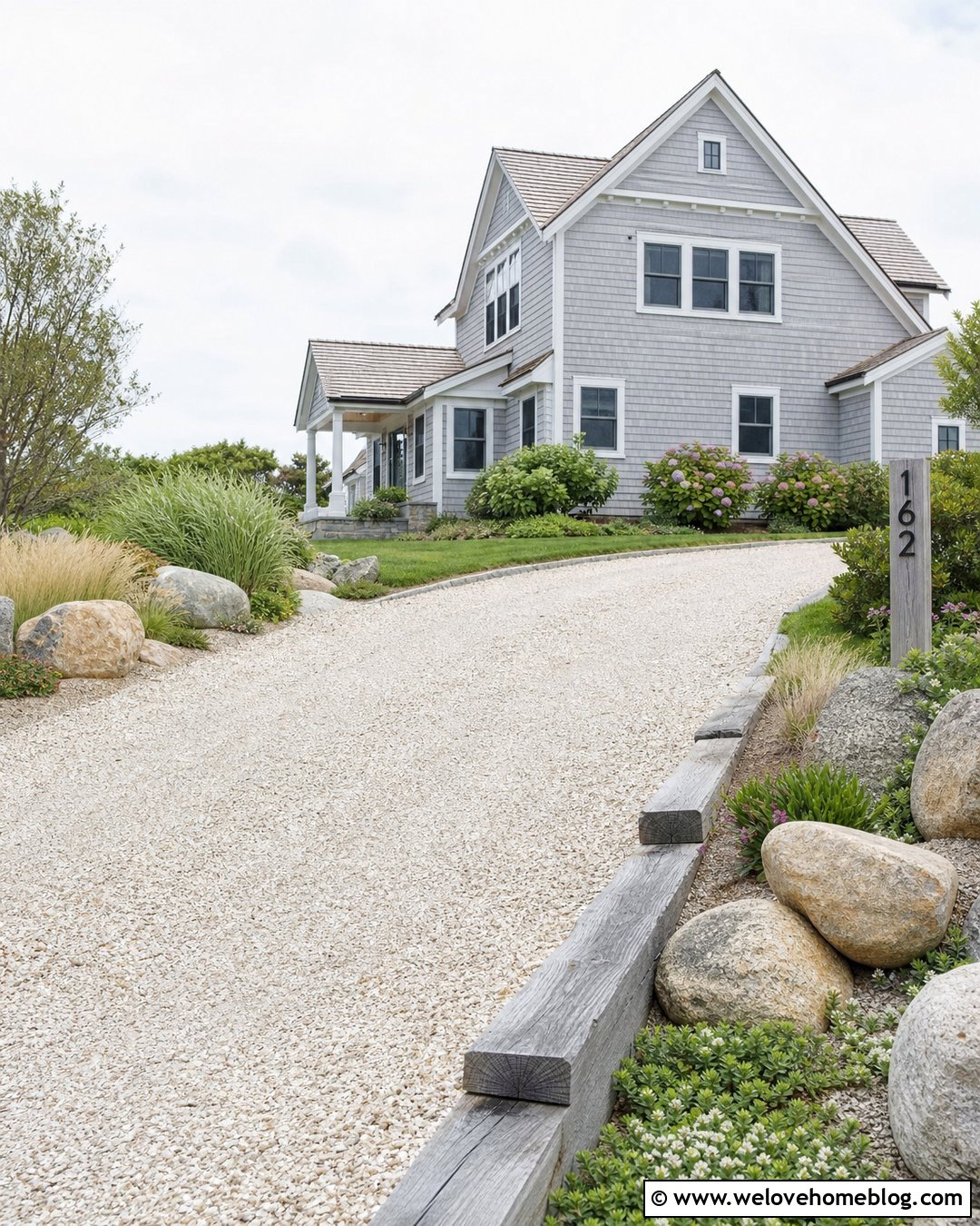 Coastal Driveway Entrance With Rounded Boulders