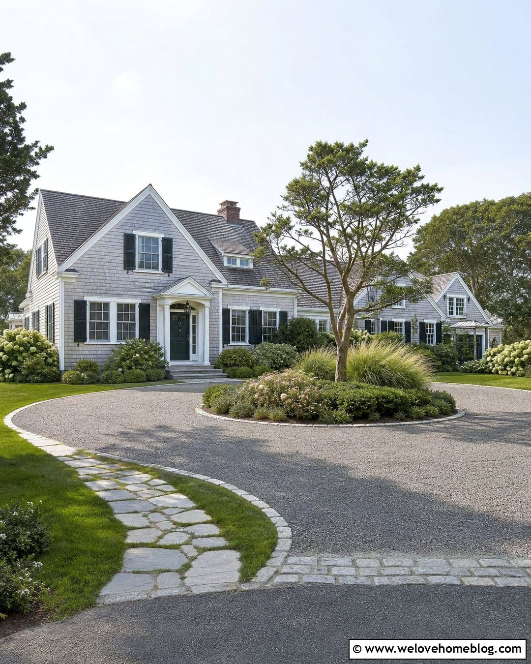 Coastal Pea Gravel Driveway With Cobblestone Edging - 20 Coastal Driveway Landscaping Ideas