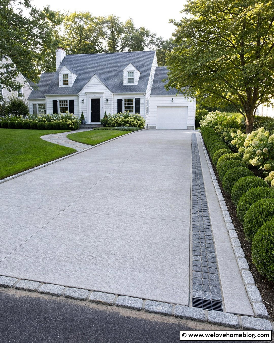 Cobblestone Drainage Strip Along A Driveway - 20 Driveway Drain Ideas