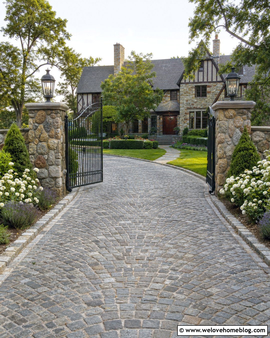 Cobblestone Driveway Entrance With Arched Gate - 20 Stylish Driveway Entrance Design Ideas