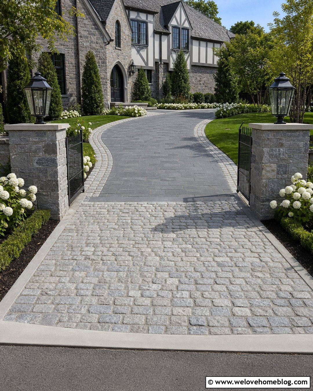 Cobblestone Driveway Entry With Lantern Pillars - 30 driveway entry ideas