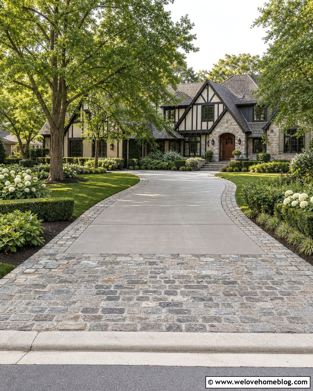 Concrete Driveway With Cobblestone Border