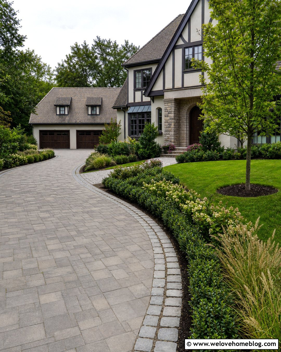 Curved Driveway With Layered Shrubs - 50 Driveway Landscaping Ideas