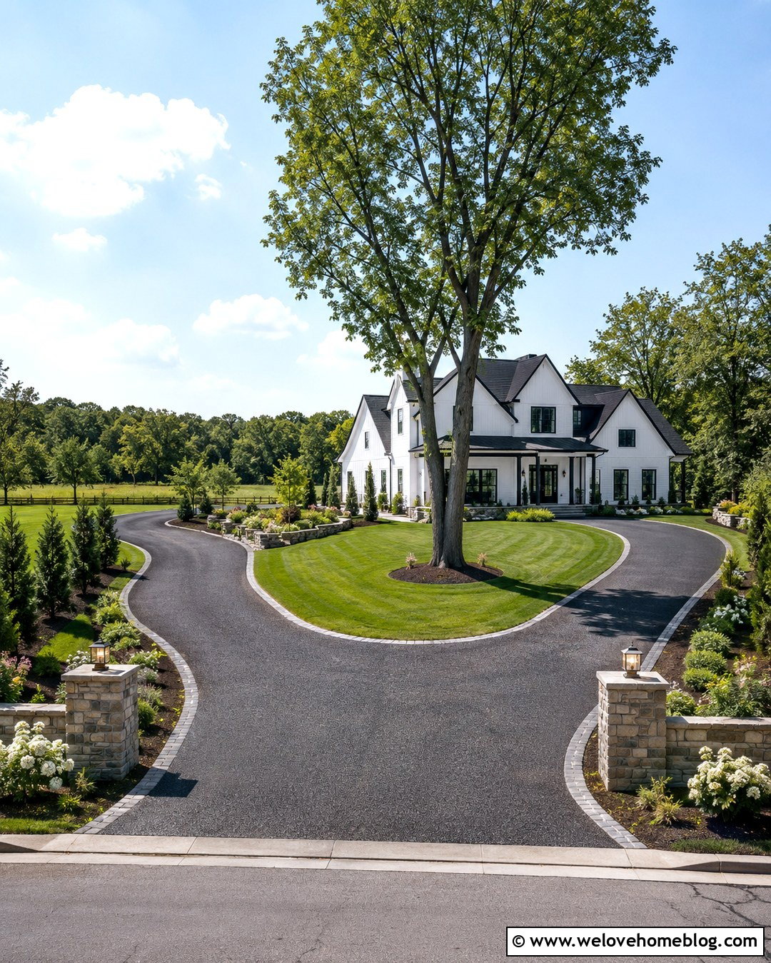 Horseshoe Black Exposed Aggregate Driveway With Stone Pillars - 20 Black Exposed Aggregate Driveway Ideas
