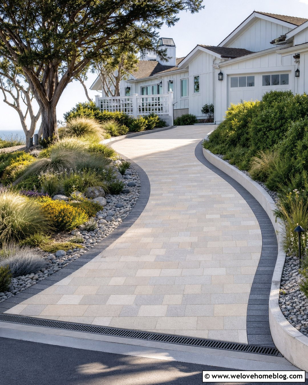 Light Paver Uphill Driveway With Coastal Landscaping - 25 Uphill Driveway Ideas