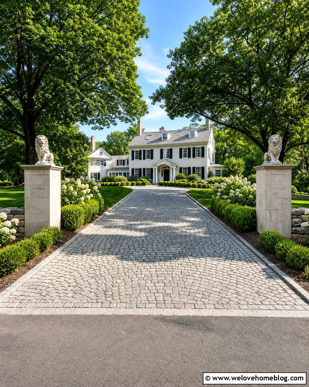 Lion Statues at a Stone Driveway Entrance - 20 Driveway Statues Ideas