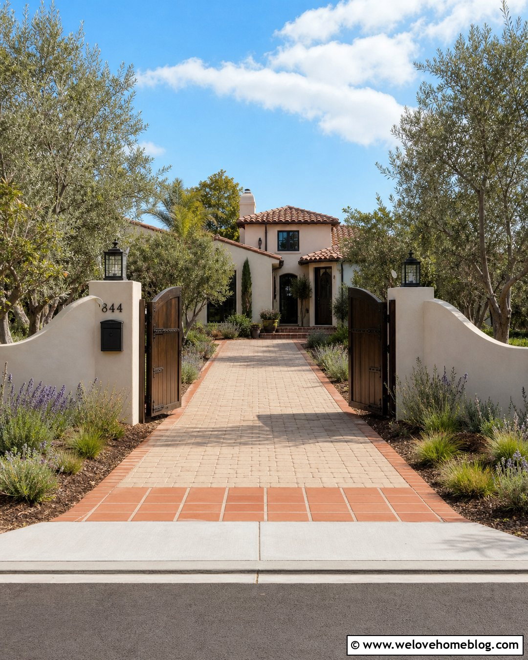 Mediterranean Driveway Entrance With Stucco Walls - 20 Stylish Driveway Entrance Design Ideas