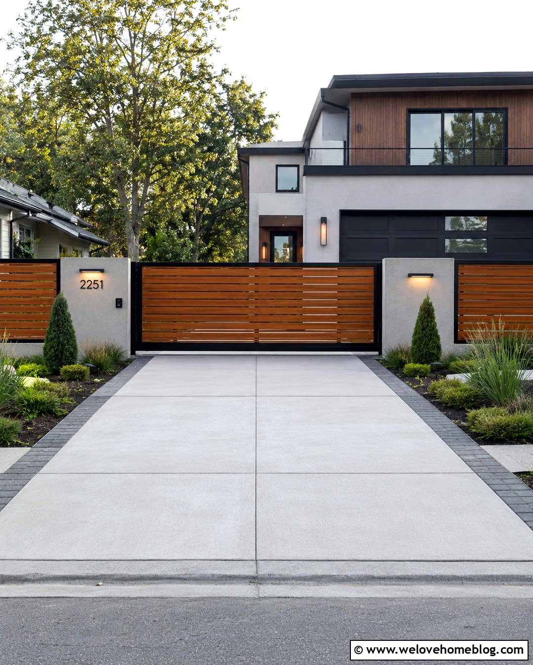 Modern Wood Sliding Gate With Concrete Driveway - 20 Private Gated Driveway Entrance Ideas