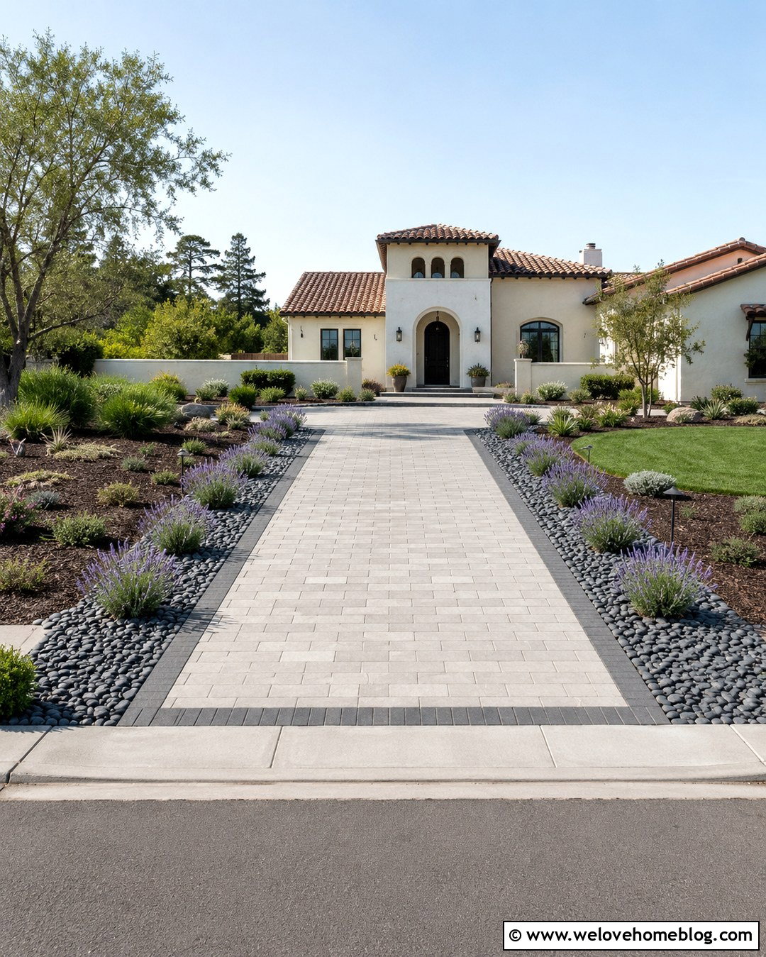 Paver Driveway Edge With Lavender And River Rock - 20 landscaping driveway edge ideas