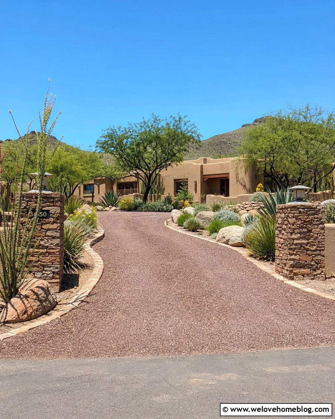 Red Gravel Rock Driveway With Stone Pillars - 20 Gravel Rock Driveway Ideas