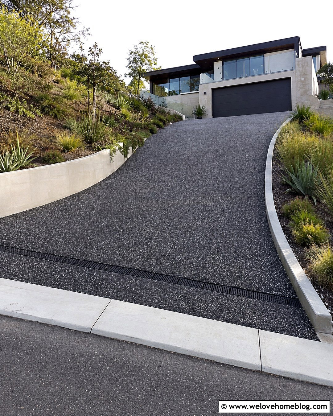 Sloped Dark Exposed Aggregate Driveway With Channel Drain - 20 Dark Exposed Aggregate Driveway Ideas